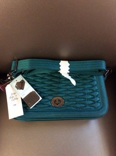 Lug crossbody