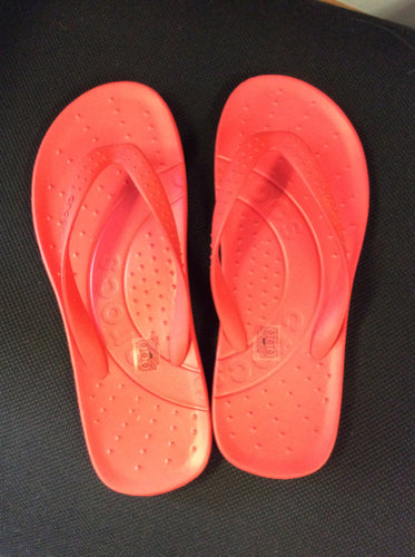 6 Croc flip flops